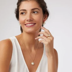 The Met Store Earrings*Celestial Symbols Carved Mother-of-Pearl Coin Hoop Earrings